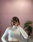 MAGLIA CON BOTTONI