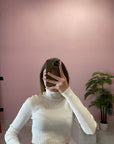 MAGLIA CON BOTTONI