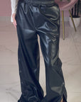 PANTALONE IN PELLE CON BOTTONI