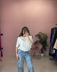 JEANS CARGO CON SLIP
